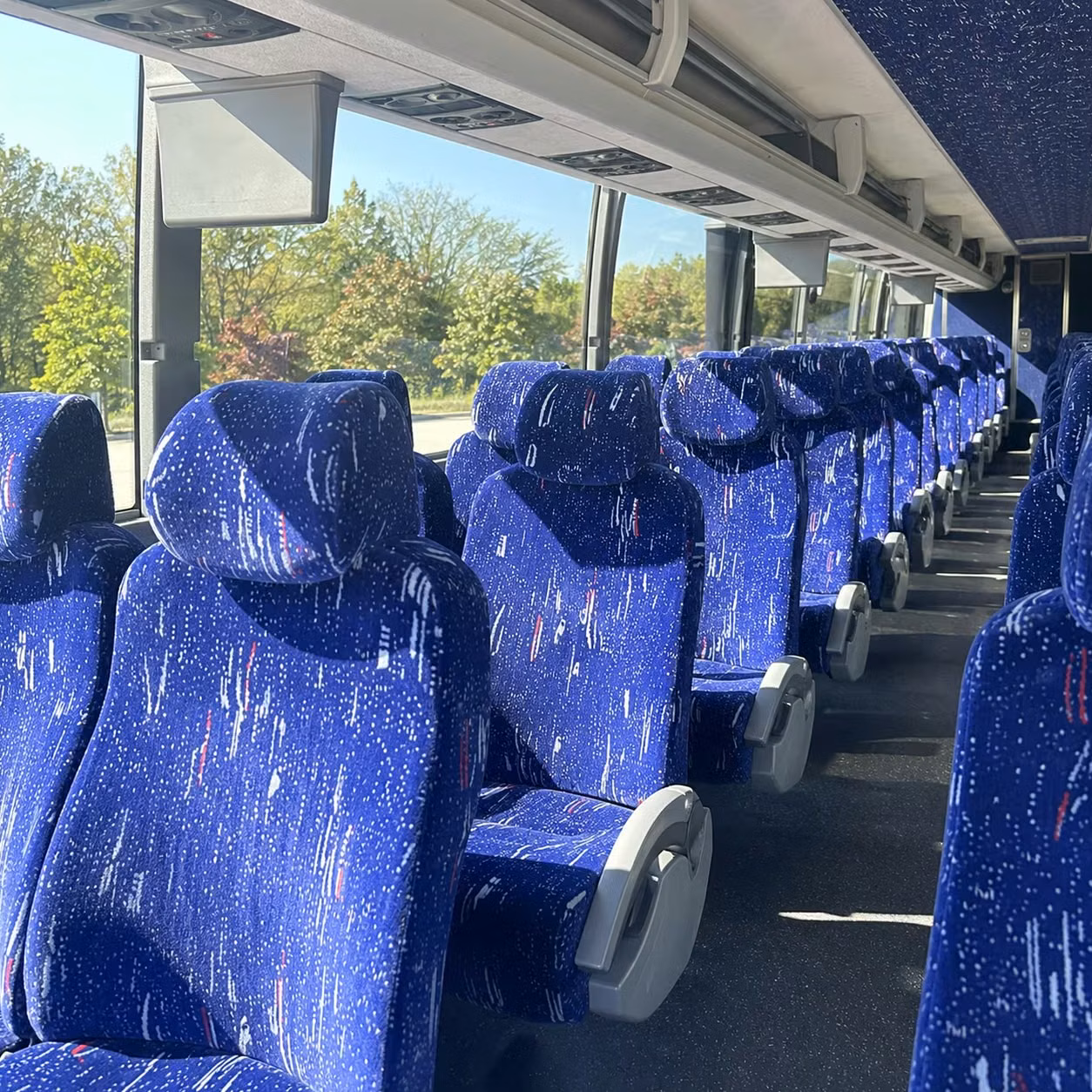how trip distance and duration affect charter bus rental rates in lawrence